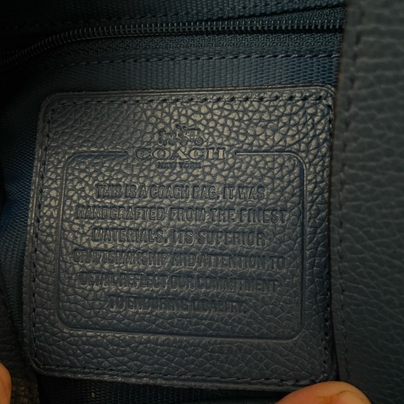 The Coach Edie bag soft slouchy silhouette style with functional design. - Picture 11 of 13